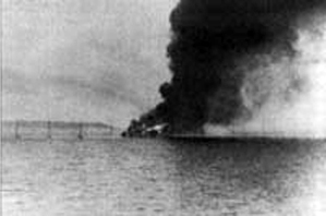 Sibiriakov on fire, photo taken from Admiral Scheer, Beluha island on the background 